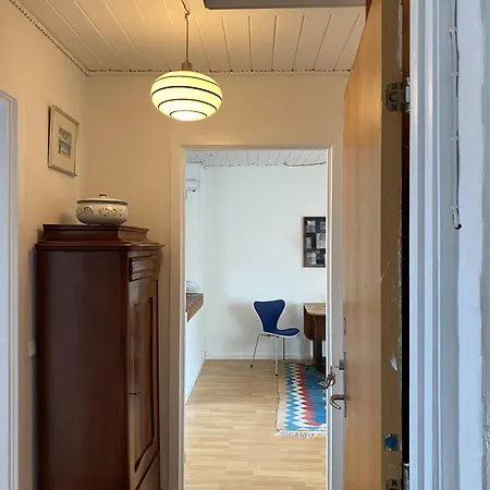 Den Gamle Vandmolle أسّينس